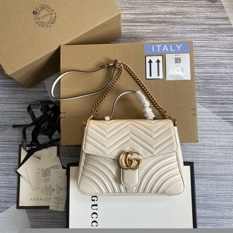 G*u*i top handle bags